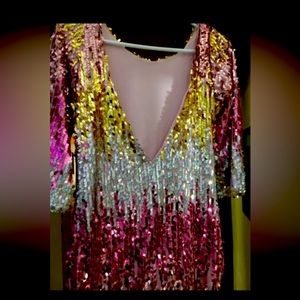 Designer dress worn once on new years. New condition size 8